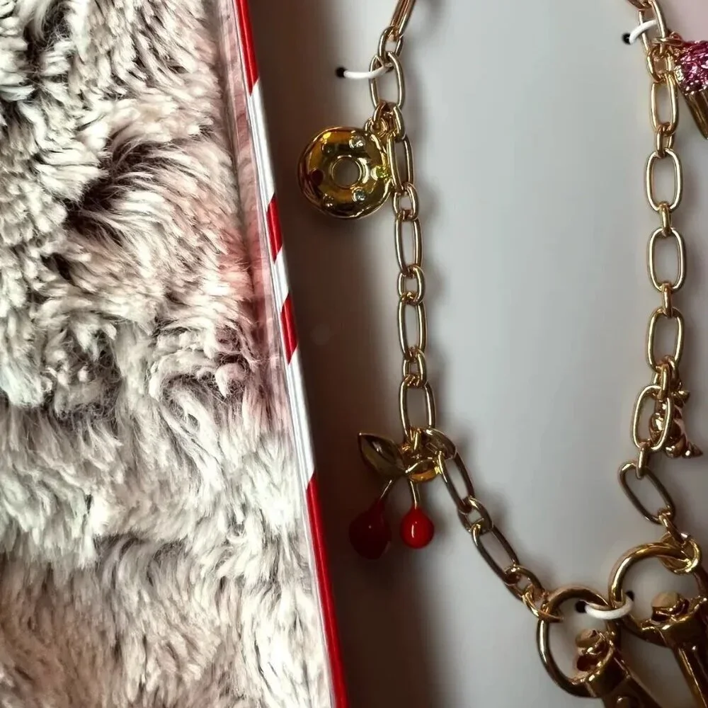 A New Day Pastry Bow And Cherry Charm Phone Strap Target Cell Wristlet Gold